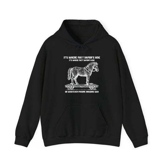 Hoodie with an illustrated Trojan horse on a wooden wheeled platform with “It’s Where Matt Damon’s Hide” design odyssey imagine dragons parody