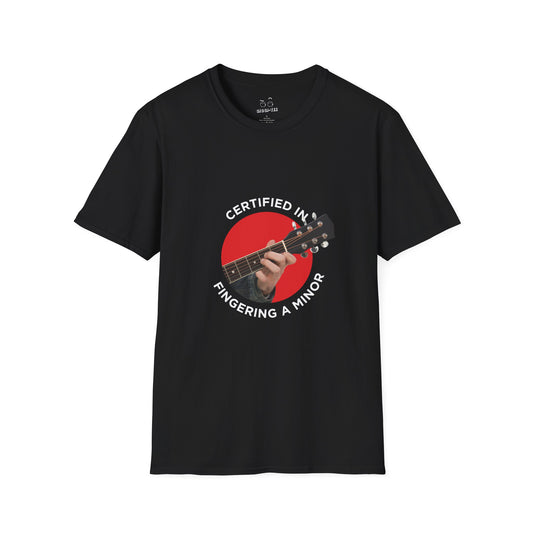 Funny t-shirt showing a hand fingering the A minor guitar chord with the phrase “Certified in Fingering A Minor,” cheeky pun for musicians.