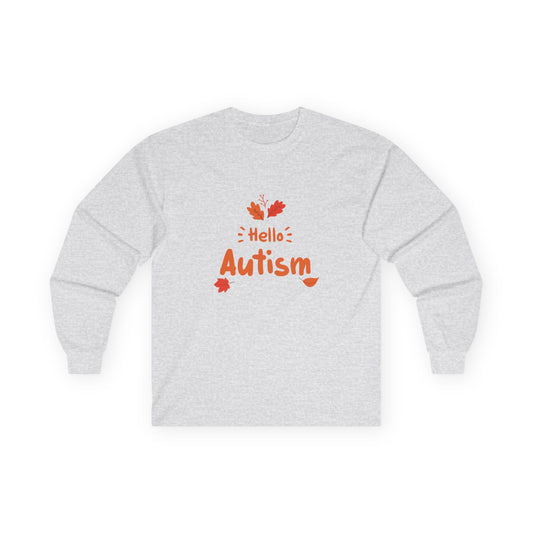 Orange “Hello Autism” text surrounded by falling autumn leaves on a parody t-shirt design, blending cozy fall vibes with edgy humor.