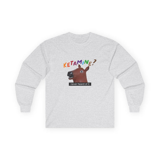 T-shirt featuring a derpy horse head mask mid-neigh, wide-eyed, “Ketamine?” in colorful handwritten letters above, and “never heard of it” on a black rectangle on its neck.