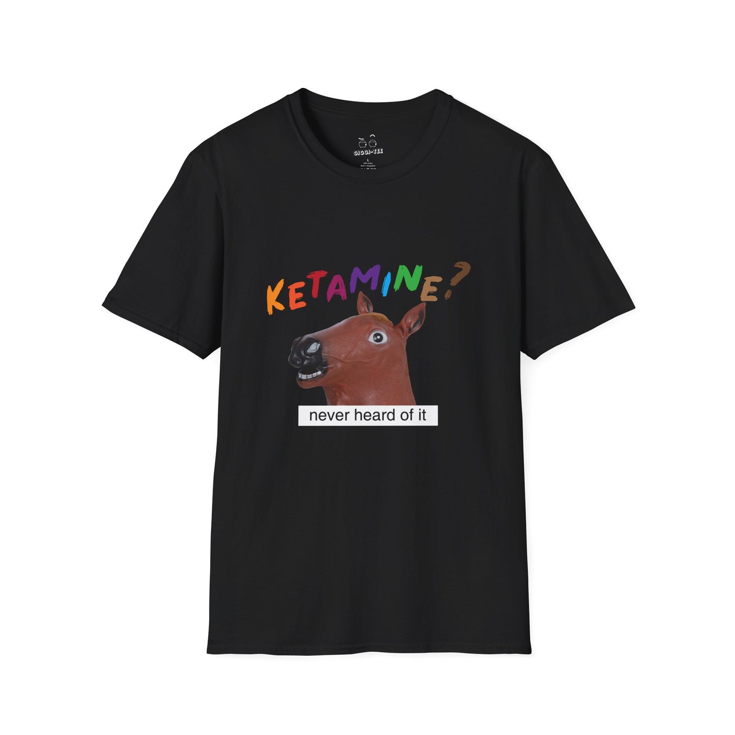 T-shirt featuring a derpy horse head mask mid-neigh, wide-eyed, “Ketamine?” in colorful handwritten letters above, and “never heard of it” on a black rectangle on its neck.