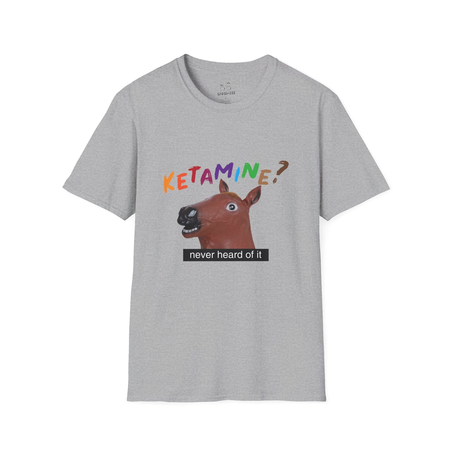 T-shirt featuring a derpy horse head mask mid-neigh, wide-eyed, “Ketamine?” in colorful handwritten letters above, and “never heard of it” on a black rectangle on its neck.