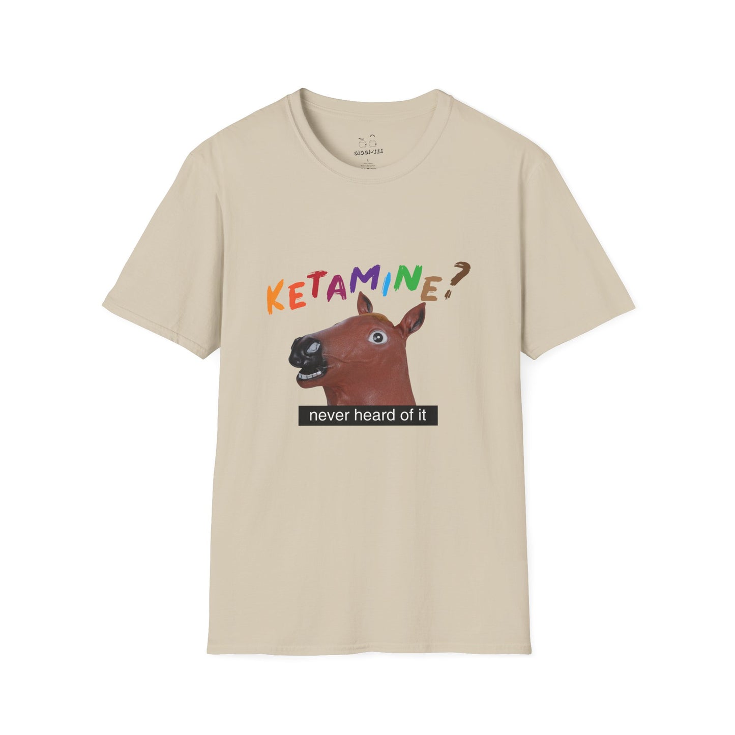 T-shirt featuring a derpy horse head mask mid-neigh, wide-eyed, “Ketamine?” in colorful handwritten letters above, and “never heard of it” on a black rectangle on its neck.