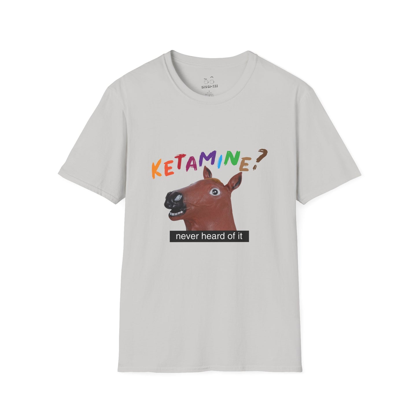 T-shirt featuring a derpy horse head mask mid-neigh, wide-eyed, “Ketamine?” in colorful handwritten letters above, and “never heard of it” on a black rectangle on its neck.