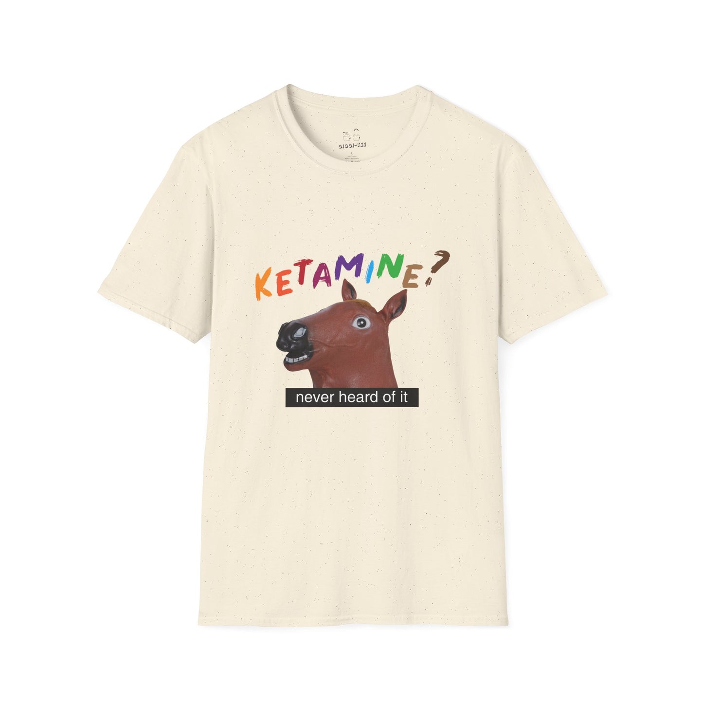 T-shirt featuring a derpy horse head mask mid-neigh, wide-eyed, “Ketamine?” in colorful handwritten letters above, and “never heard of it” on a black rectangle on its neck.