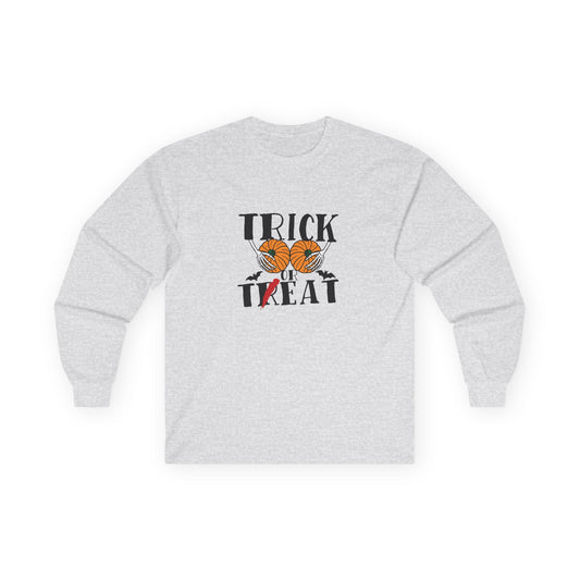 Skeleton hands holding two pumpkins like breasts with the text “Trick or Teat”, a funny Halloween pun shirt design.
