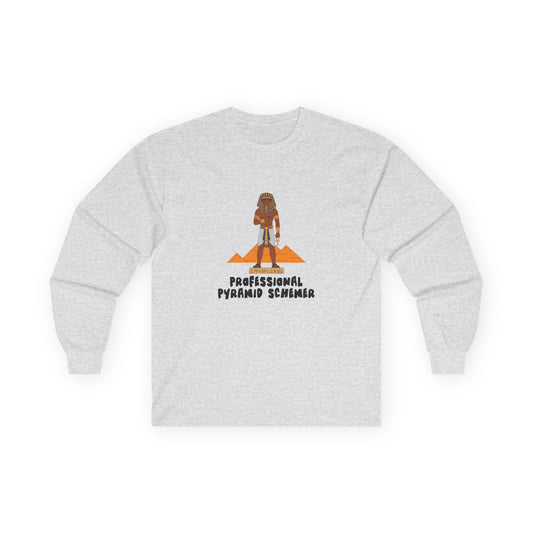 Long sleeve shirt featuring an illustration of a pharaoh standing in front of pyramids with the text “Professional Pyramid Schemer” in a humorous wordplay design.