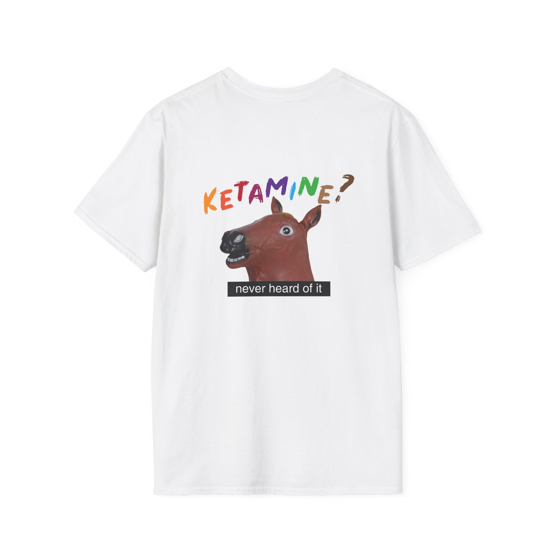 Back print t-shirt featuring a derpy horse head mask mid-neigh, wide-eyed, “Ketamine?” in colorful handwritten letters above, and “never heard of it” on a black rectangle on its neck.