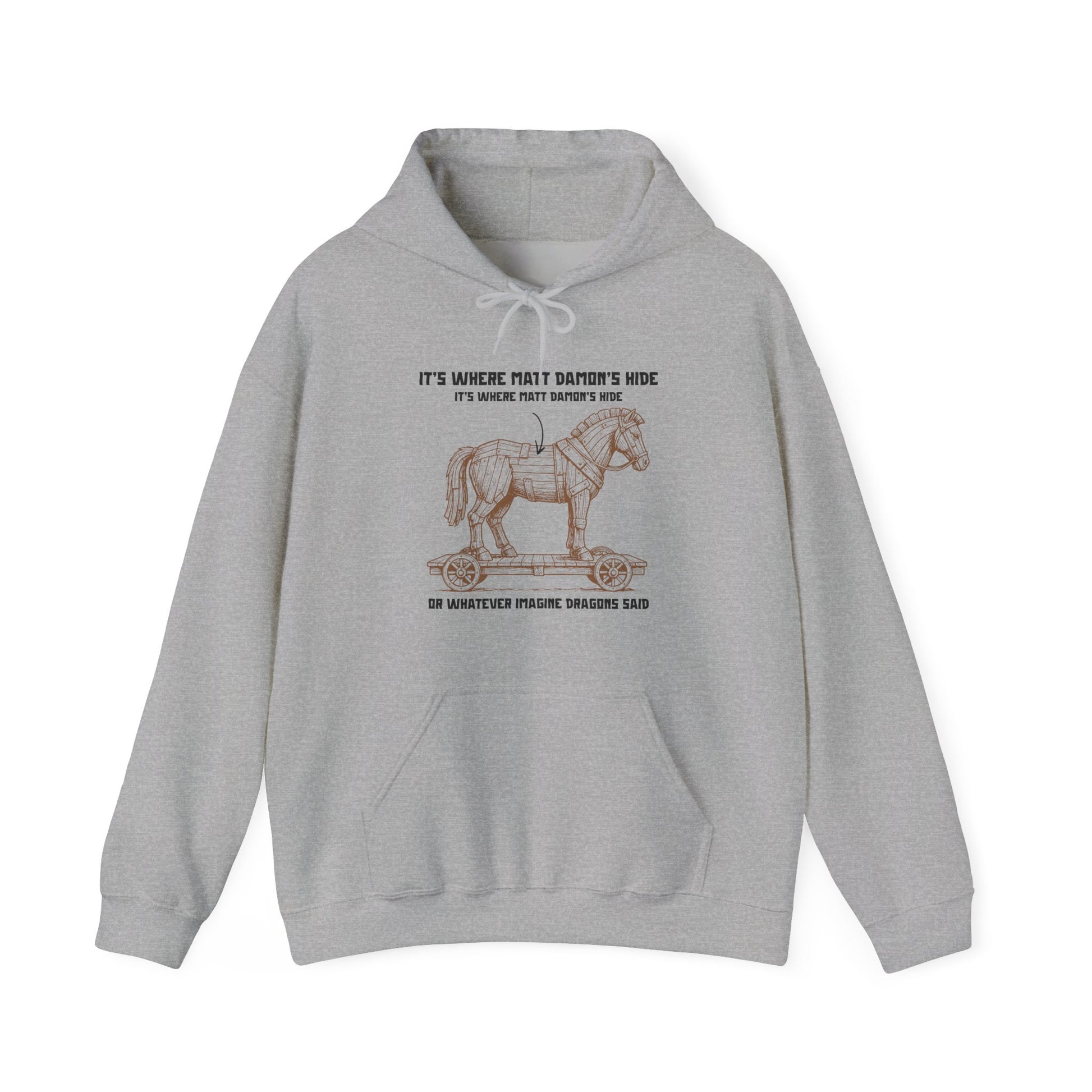 Hoodie with an illustrated Trojan horse on a wooden wheeled platform with “It’s Where Matt Damon’s Hide” design odyssey imagine dragons parody