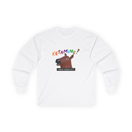 T-shirt featuring a derpy horse head mask mid-neigh, wide-eyed, “Ketamine?” in colorful handwritten letters above, and “never heard of it” on a black rectangle on its neck.