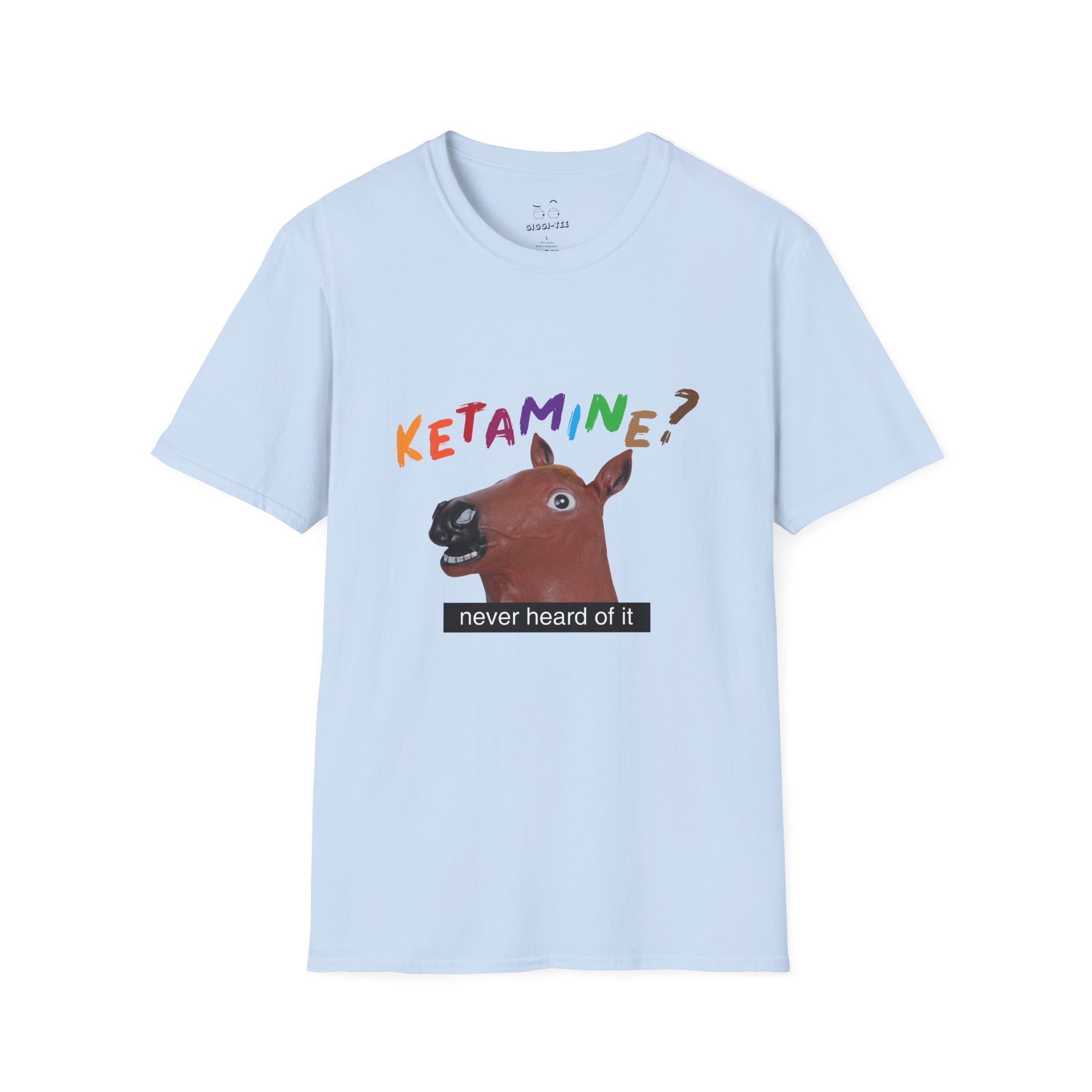 T-shirt featuring a derpy horse head mask mid-neigh, wide-eyed, “Ketamine?” in colorful handwritten letters above, and “never heard of it” on a black rectangle on its neck.