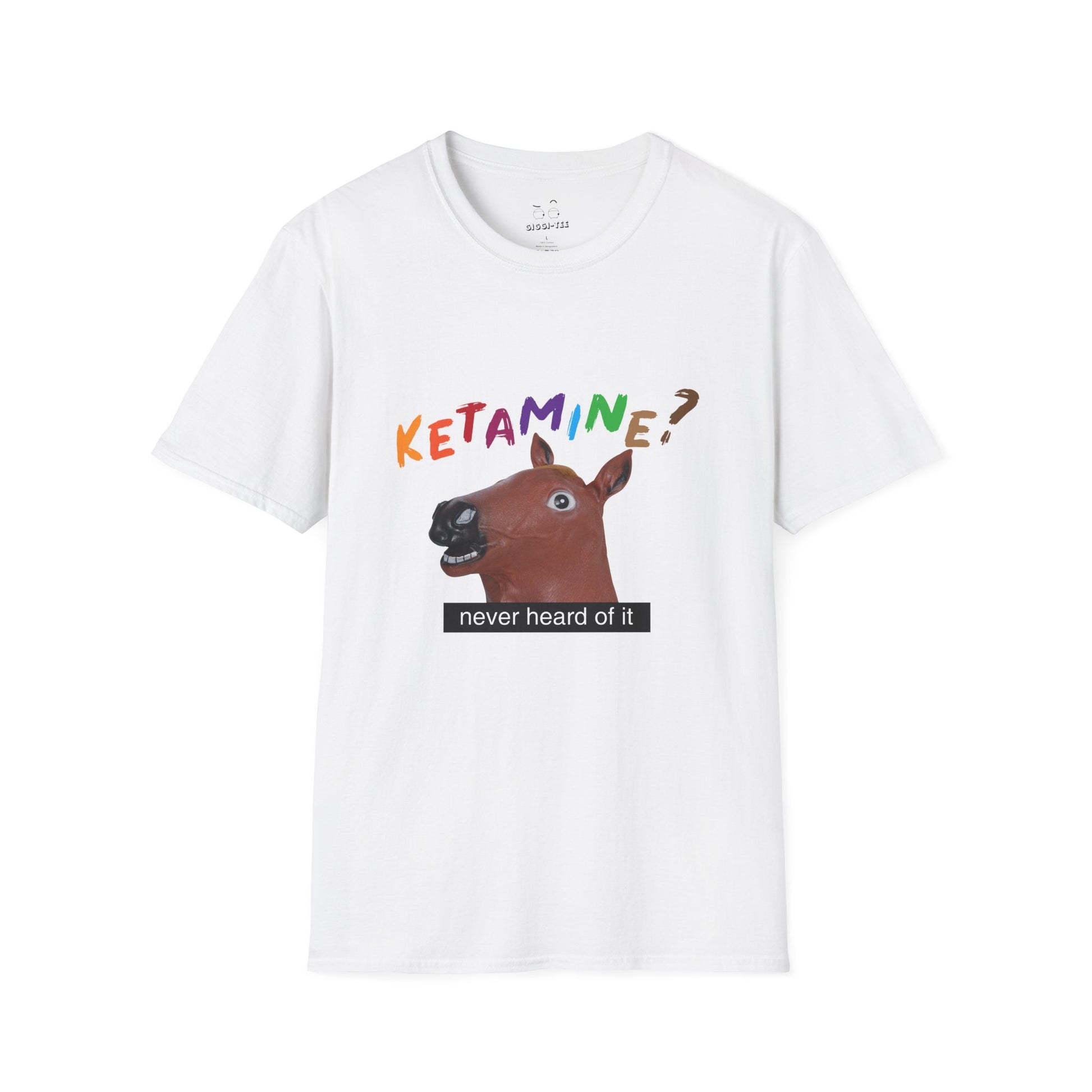 T-shirt featuring a derpy horse head mask mid-neigh, wide-eyed, “Ketamine?” in colorful handwritten letters above, and “never heard of it” on a black rectangle on its neck.